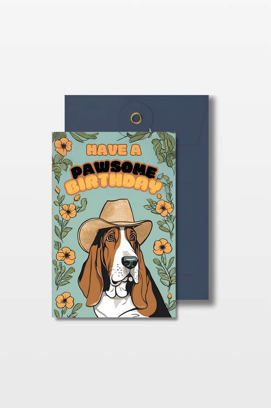 Verjaardagskaart met een schattige basset hound en een blauwe envelop